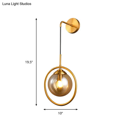 Aplique de pared DecorBites™ contemporáneo de cristal gris humo/transparente/ámbar: Aplique individual con acabado en latón