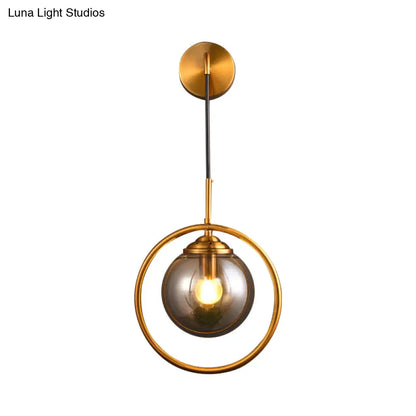 Aplique de pared DecorBites™ contemporáneo de cristal gris humo/transparente/ámbar: Aplique individual con acabado en latón