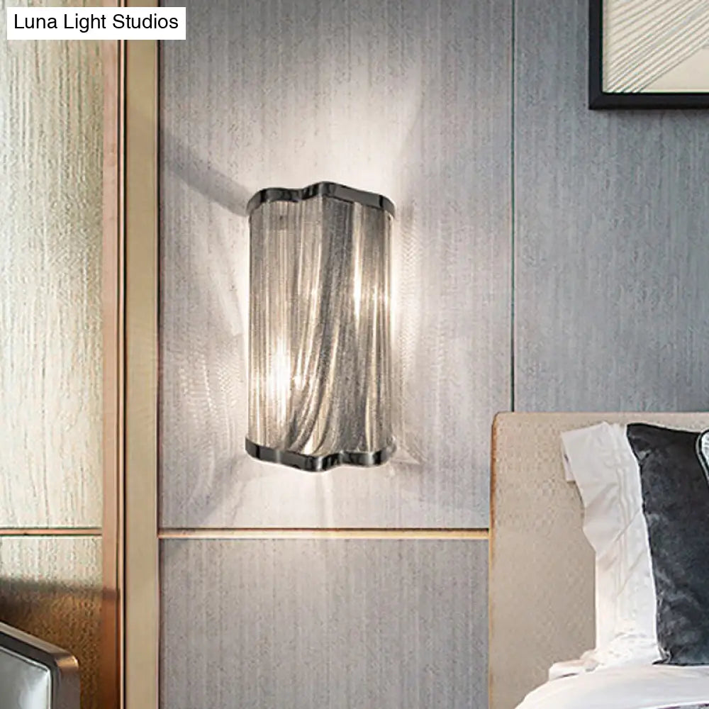 Aplique de pared DecorBites™ Contemporary Tassels de aluminio, 1 luz, acabado plateado.