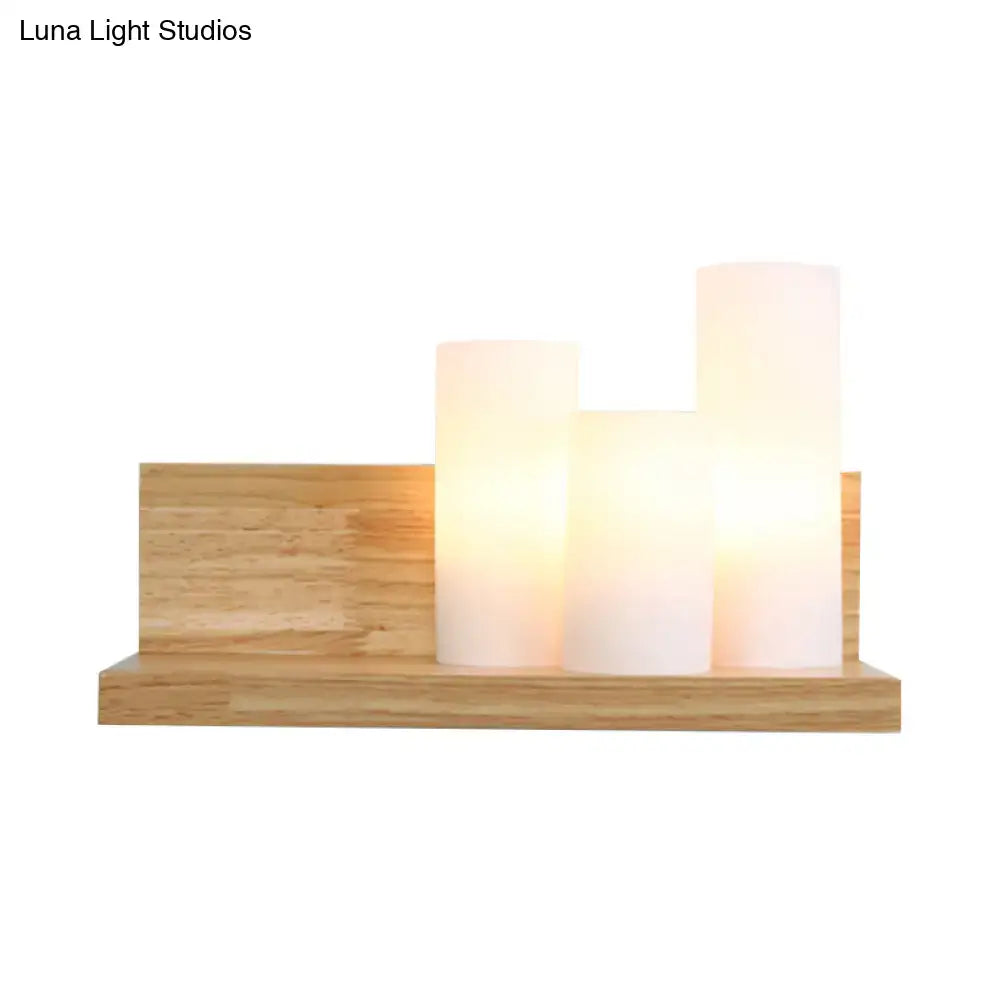 Contemporary tube shade wall lamp with wooden shelf featuring three illuminated frosted glass candle-style lamps for cloth shop 220v-240v