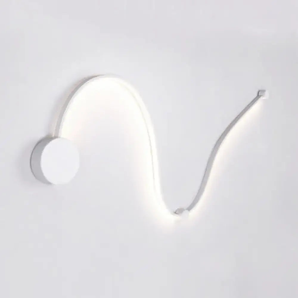 Contemporary twist wall sconce in white with sleek curved design and minimalist finish for bedroom warm white light