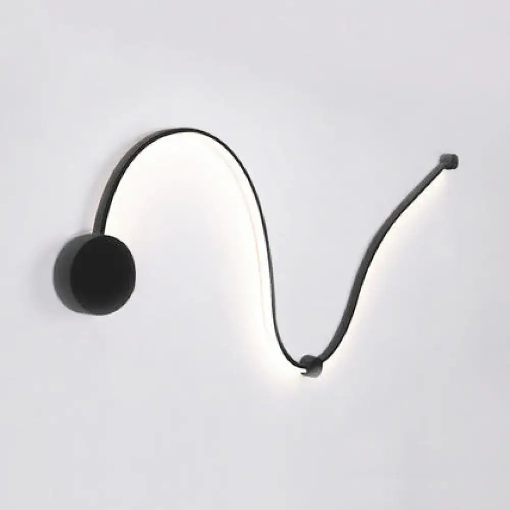 Contemporary twist black and white wall sconce with sleek curved design and integrated white warm led lighting for bedroom