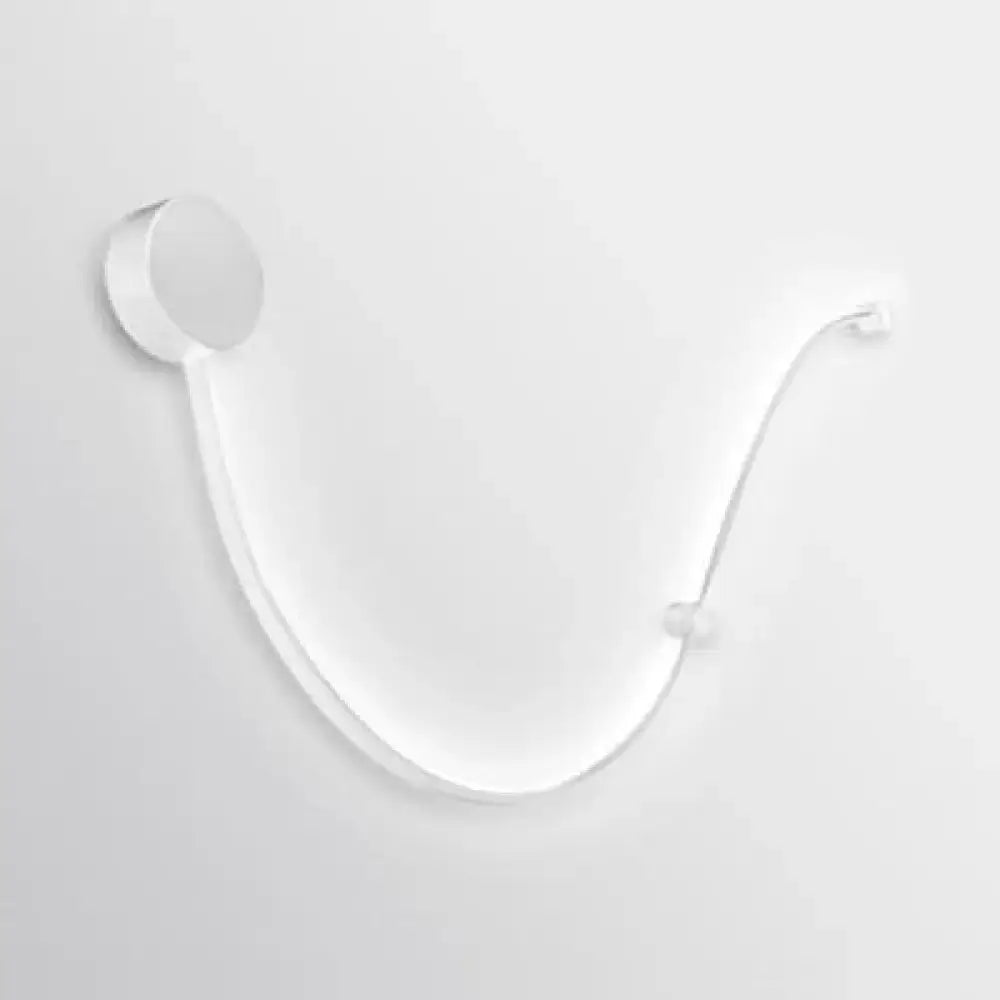 Minimalist white wall-mounted mirror with curved frame and circular mounts complements contemporary twist wall sconce white warm light