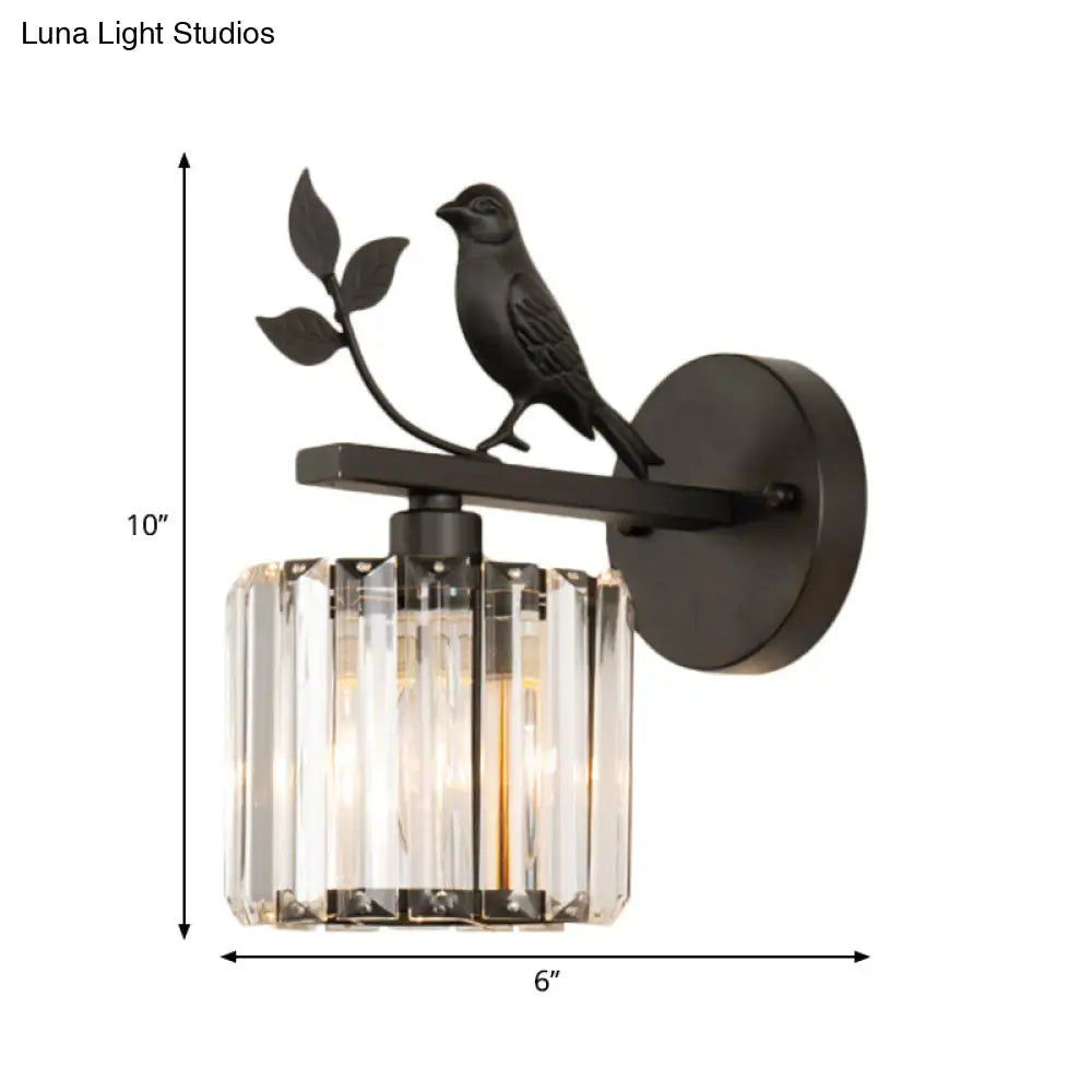 Aplique de pared contemporáneo DecorBites™ con cilindro de cristal K9, detalle de pájaro y acabado negro/dorado.