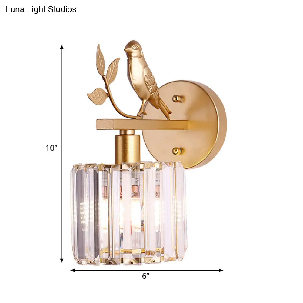 Aplique de pared contemporáneo DecorBites™ con cilindro de cristal K9, detalle de pájaro y acabado negro/dorado.