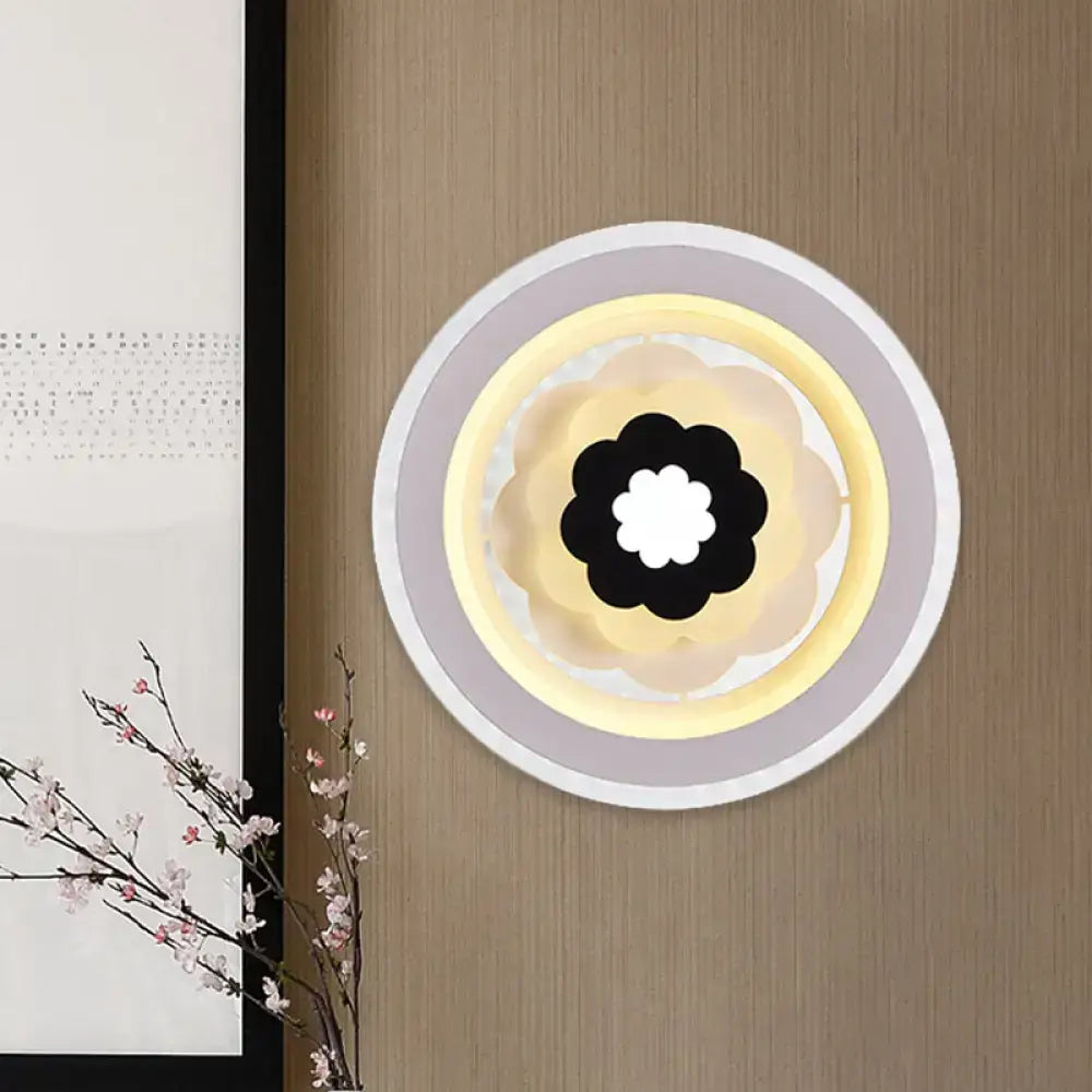 Contemporary 10 inches fixture white and beige led wall sconce with concentric rings and black floral design center