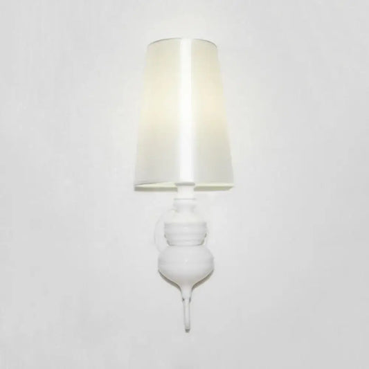 Contemporary white ceramic wall light with a tapered satin-finished lampshade and e26 e27 bulb base for bedroom use
