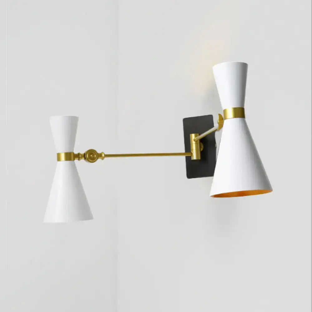 Contemporary white conical wall sconce with gold accents and black mounting plate featuring adjustable arm design