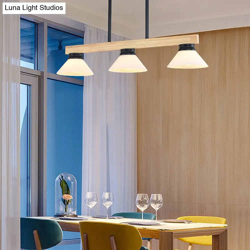 Contemporary wood linear island ceiling light with modern wooden pendant, frosted glass shades, and gold black accents