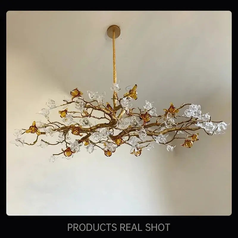Elegant gold-toned decorbites copper branch pendant chandelier with clear and amber glass blossoms for living room decor