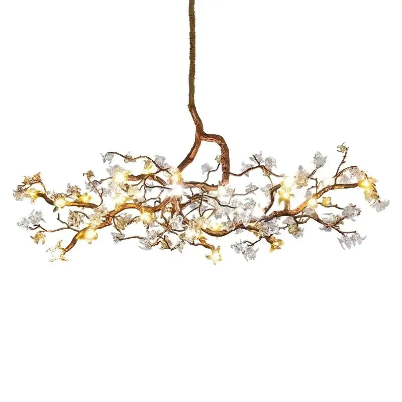 Copper branch pendant chandelier with warm led bulbs and white blossoms for elegant living room decorbites copper branch lighting