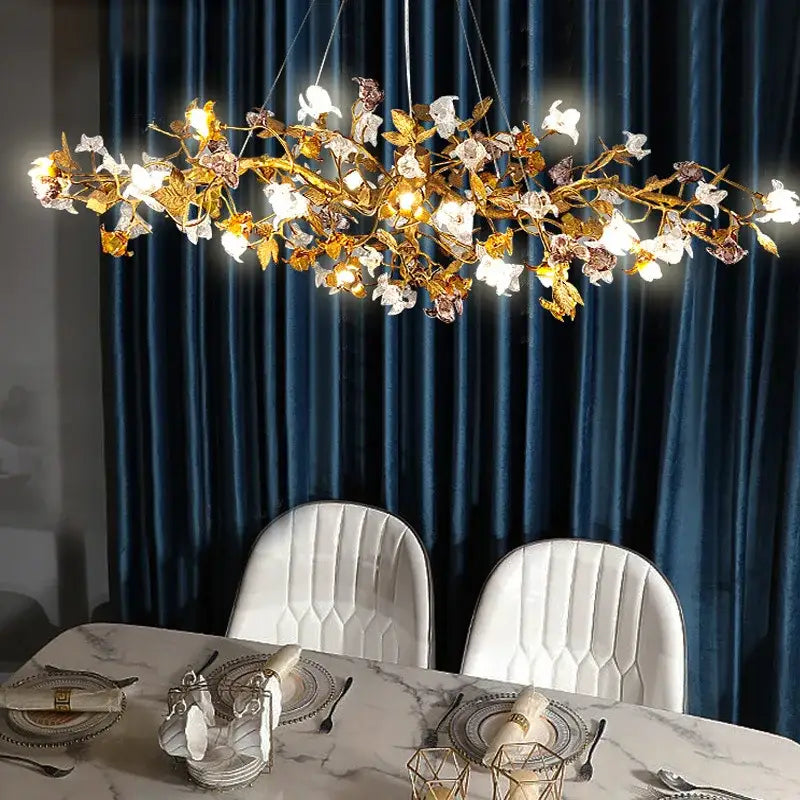 Gold-toned decorbites copper branch pendant chandelier with floral leaf designs and crystal accents for living room decor