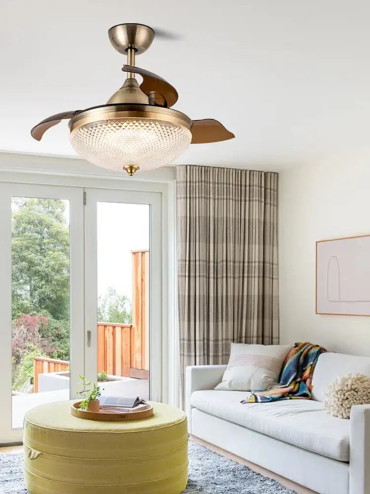 Brass-finished copper bronze ceiling fan with three wooden blades and textured glass shade for bedroom decorbites ceiling fan