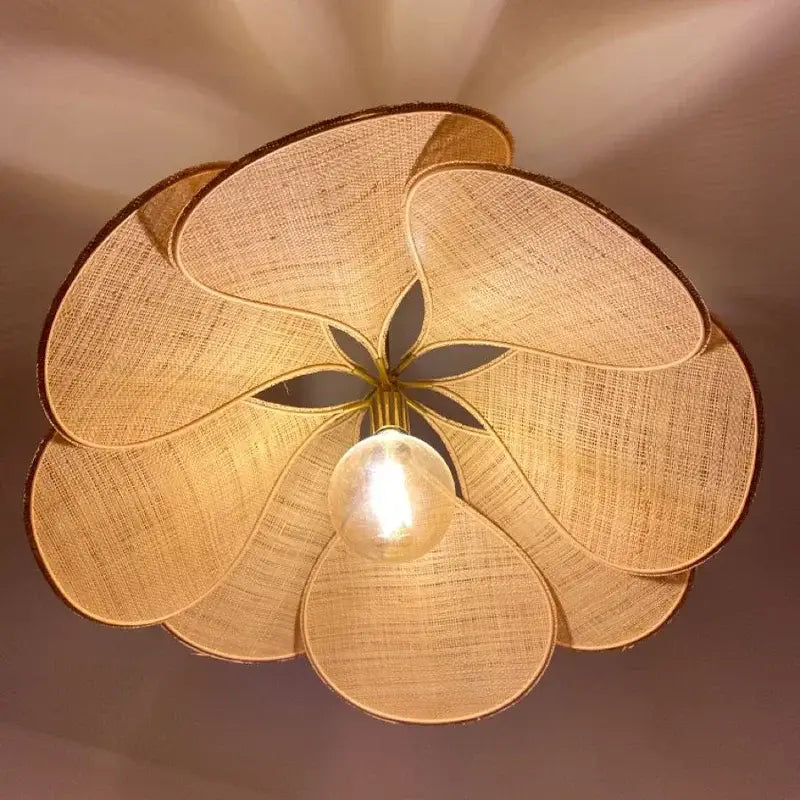 Copper petal fabric pendant light with warm-toned woven floral design featuring central bulb for dining room decorbites colorful petal