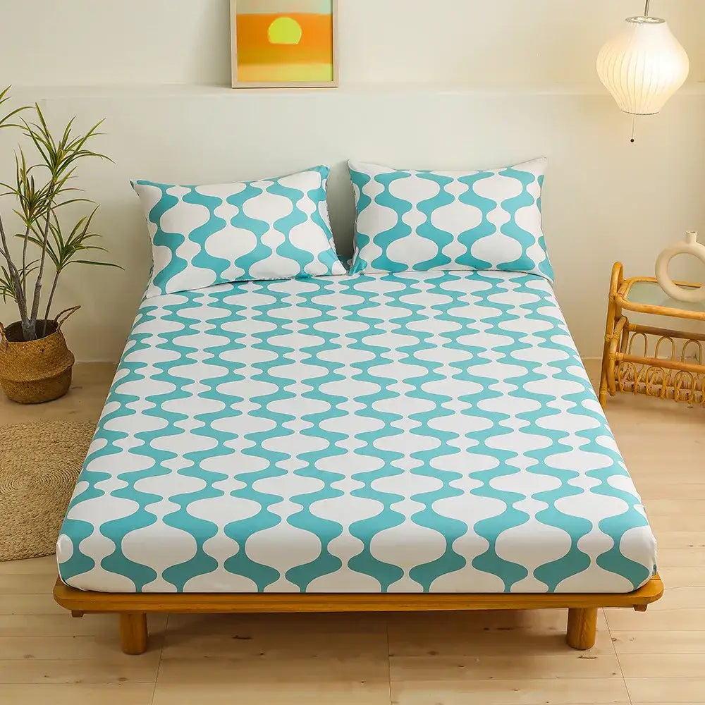 Coral and white geometric floral fitted sheet set featuring turquoise and white patterned fitted sheet for bedroom bedding