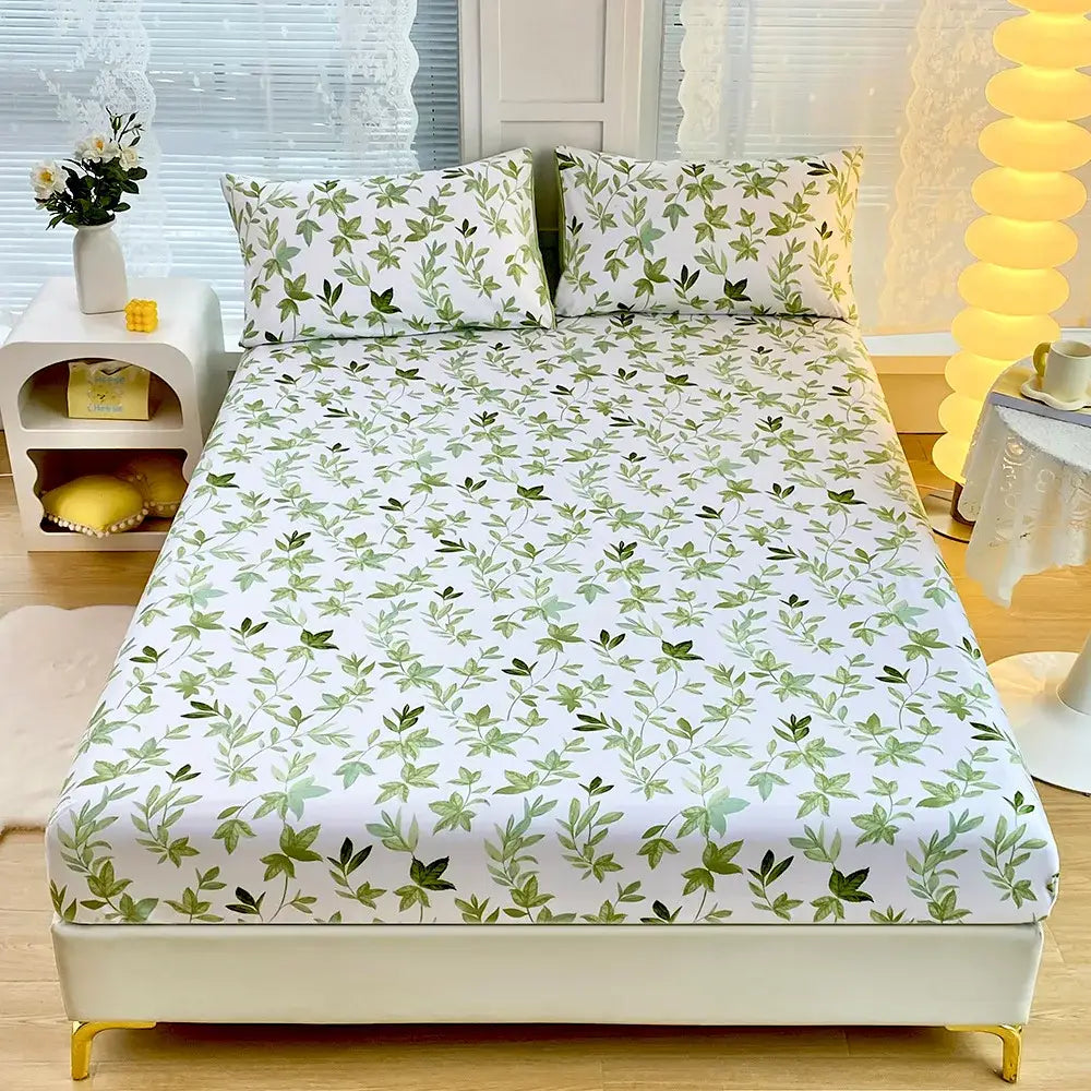 White fitted sheet set with delicate green leaf flower pattern for bedroom bedding with coral and white geometric floral design