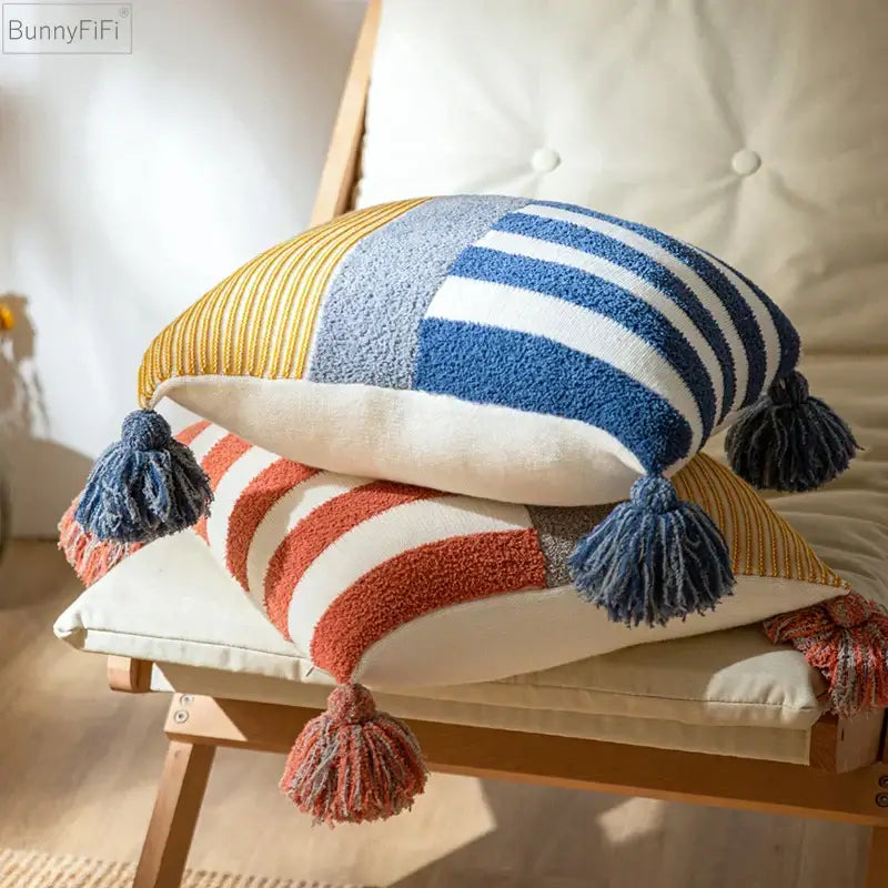 Stacked patchwork cushion covers 45x45cm with textured yellow blue and orange stripes and fluffy tassels for home decor