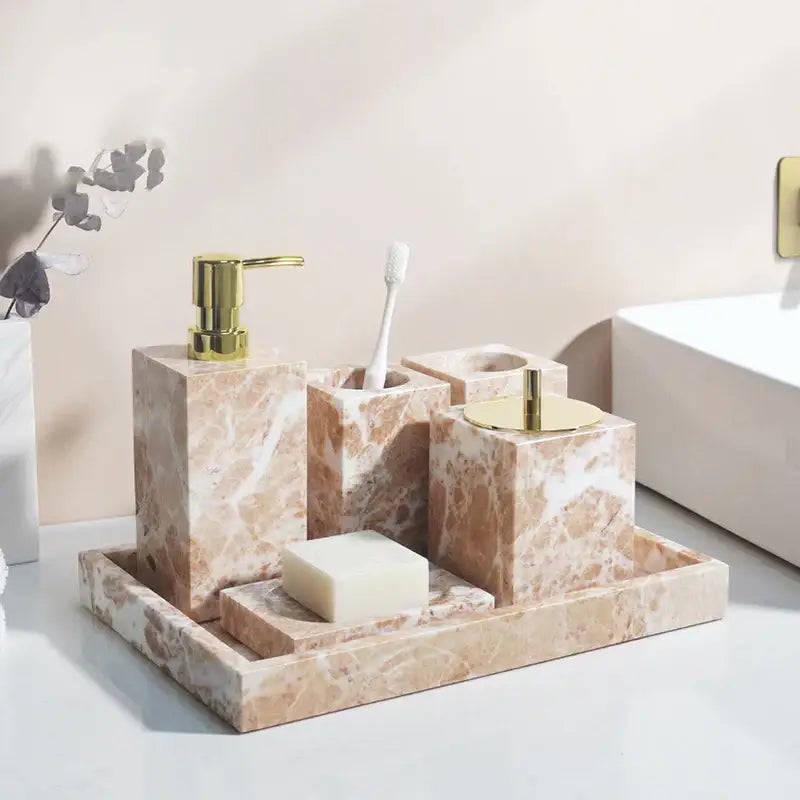 Coralb pink marble bathroom accessories set with gold accents featuring beige marble pieces for elegant decorbites coral pink decor