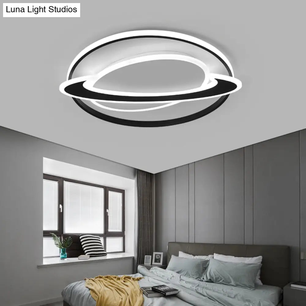 DecorBites™ DecorBites™ Cosmic Bedroom Glow: Black-White Acrylic LED Flush Mount Ceiling Light with a Ringed Planet Design