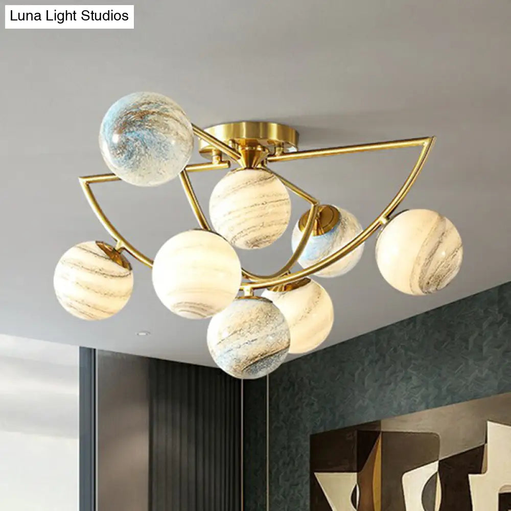 DecorBites™ DecorBites™ Cosmic Bedroom Glow: Gold Nordic Ombre Glass Semi-Flush Mount Chandelier with a Planet Design
