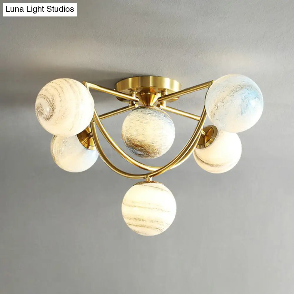 DecorBites™ DecorBites™ Cosmic Bedroom Glow: Gold Nordic Ombre Glass Semi-Flush Mount Chandelier with a Planet Design