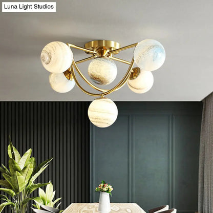 DecorBites™ DecorBites™ Cosmic Bedroom Glow: Gold Nordic Ombre Glass Semi-Flush Mount Chandelier with a Planet Design
