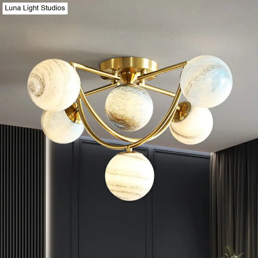 DecorBites™ DecorBites™ Cosmic Bedroom Glow: Gold Nordic Ombre Glass Semi-Flush Mount Chandelier with a Planet Design