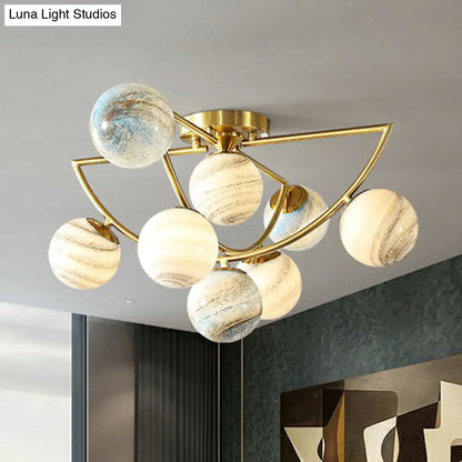 DecorBites™ DecorBites™ Cosmic Bedroom Glow: Gold Nordic Ombre Glass Semi-Flush Mount Chandelier with a Planet Design