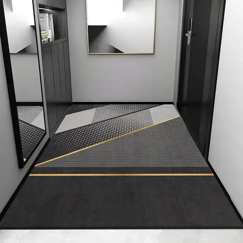 Modern geometric-patterned cosmic grey crystal velvet entrance rug in black gray and gold tones with textured surface
