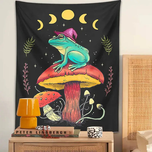 A vibrant black mushroom tapestry wall hanging featuring a teal frog on a red and yellow mushroom decorbites frog design