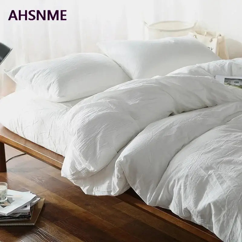 Soft textured white 100 percent cotton DecorBites duvet cover set with subtle crinkle finish for 50x75cm and 50x70cm beds