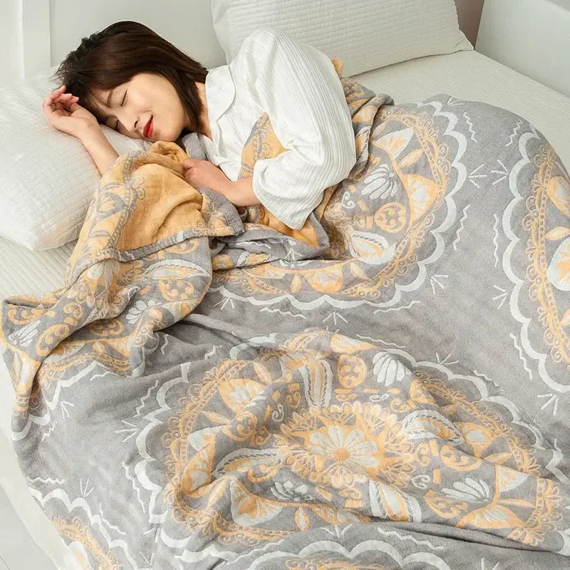 Gray and gold patterned plush cotton gauze boho throw blanket with intricate floral mandala designs by decorbites cotton gauze