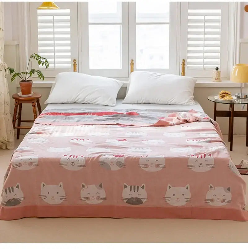 Pink cotton gauze boho throw blanket with cartoon cat faces in white and gray for bedroom decorbites cotton gauze