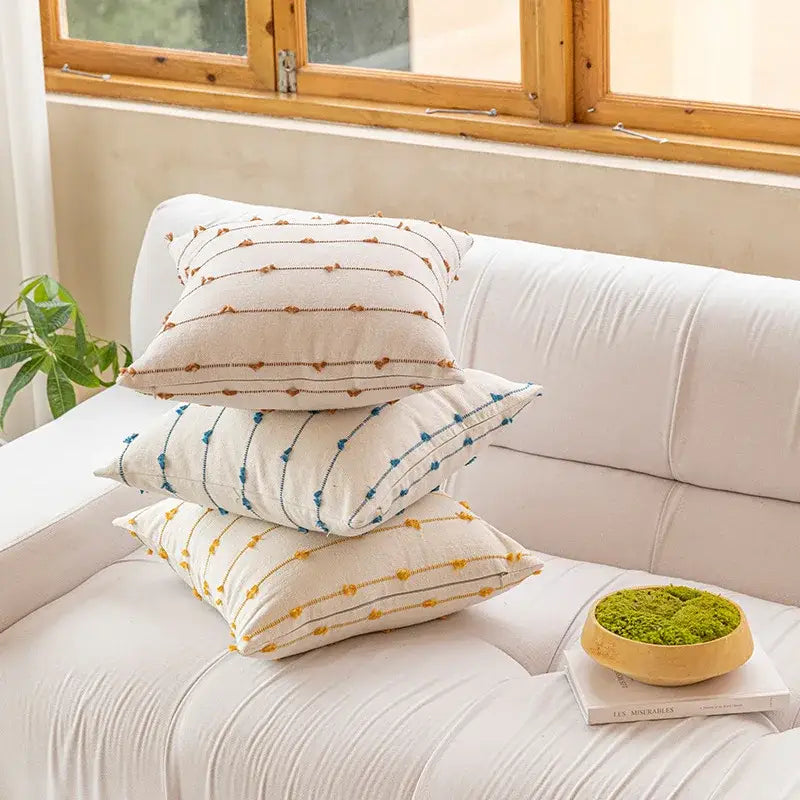 Stack of three cotton stripe jacquard cushion covers in cream blue and yellow with dotted line patterns for living room decorbites cotton stripe