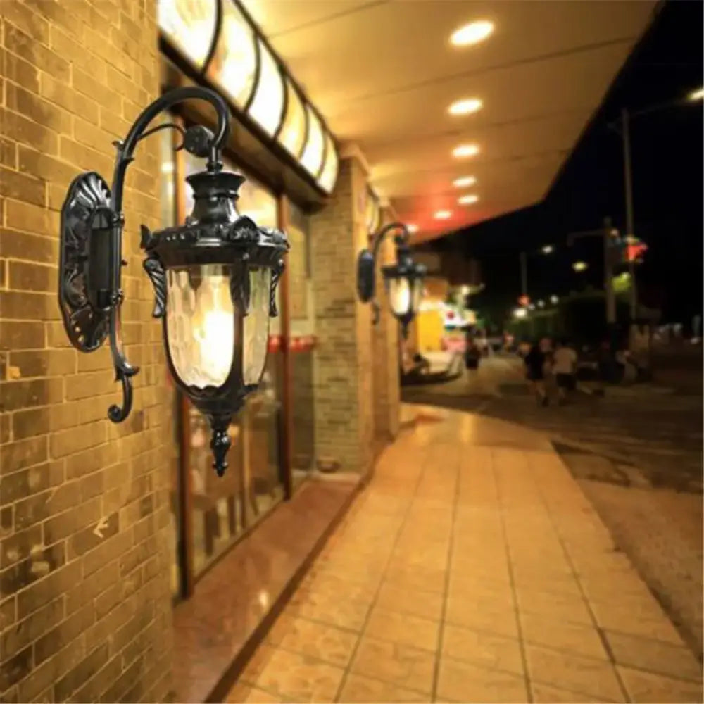 Country black wrought iron outdoor wall lantern with textured glass lantern for outdoor wall and restaurant lighting