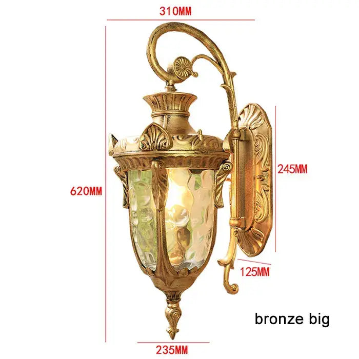 Bronze-finished country black wrought iron outdoor wall lantern with ornate scrollwork and textured glass panels
