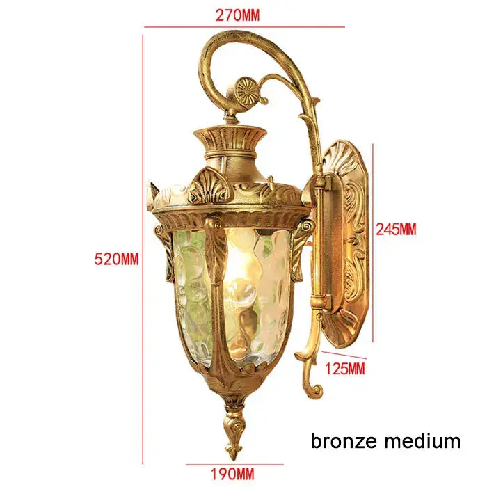 Bronze medium wall lantern with ornate scrollwork and textured glass for outdoor wall use in restaurants