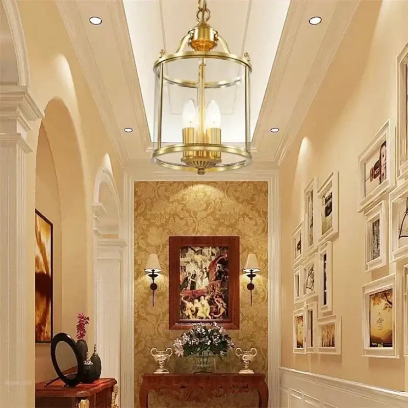 Brass lantern ceiling fixture with clear glass panels and three exposed bulbs in decorbites bronze glass pendant lights