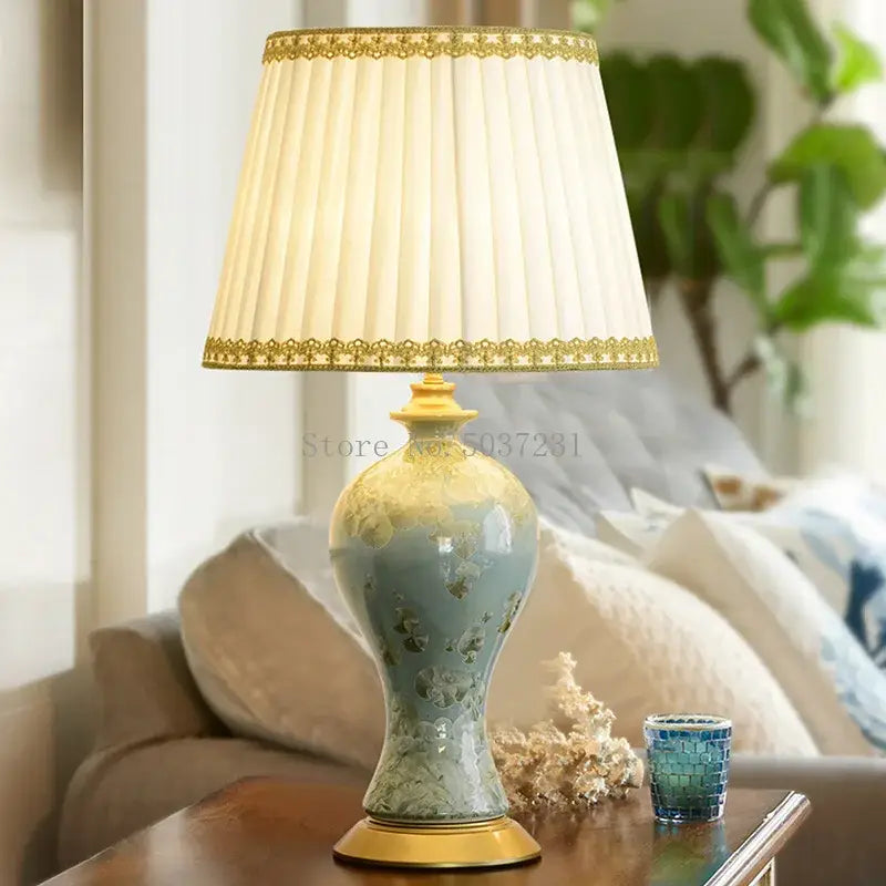 Country ceramic table lamp pair in celadon with light blue and gold floral glaze and off-white pleated shade decorbites table lamp