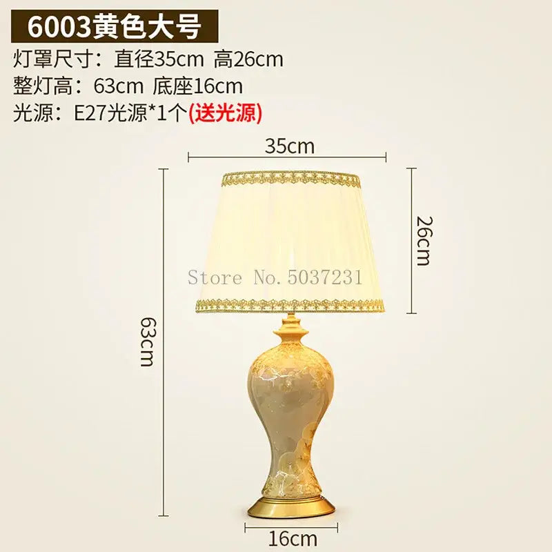 Golden ceramic table lamp with ornate vase-shaped base and cream fabric shade for decorbites country ceramic bedroom decor