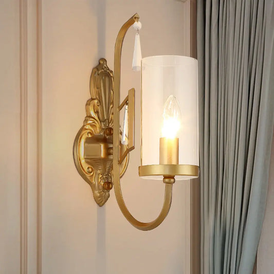 Country Clear Glass Wall Sconce with Curved Arm - Gold Cylinder Surface Lighting for Living Room