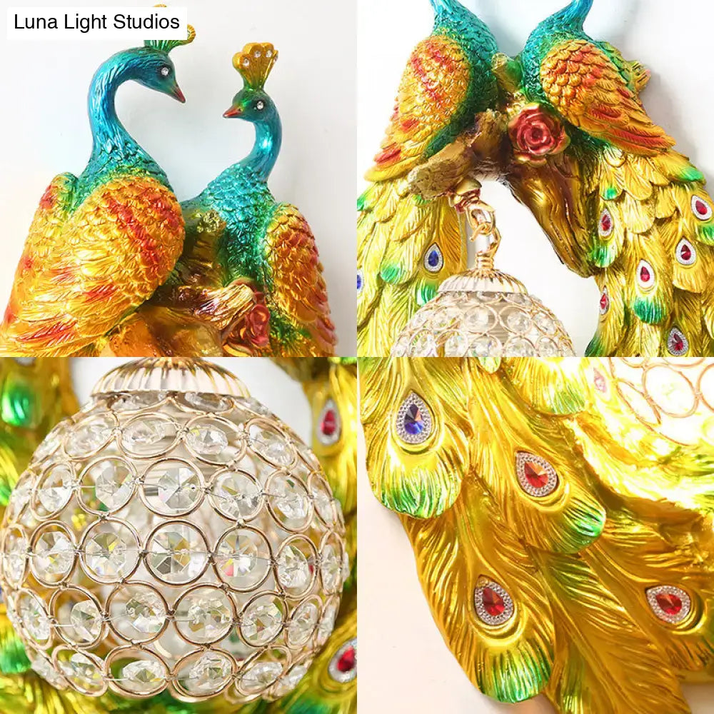 Country gold peacock wall sconce with vibrant iridescent feathers and crystal lampshade for bedroom lighting