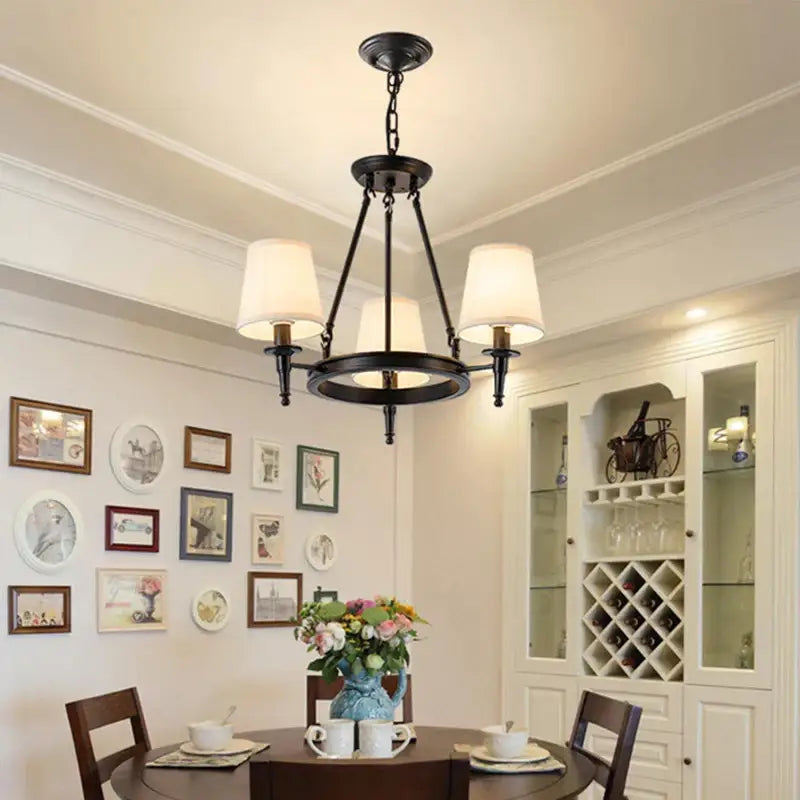 Black wrought iron country retro chandelier with three cream fabric shades bronze pendant light for dining room decorbites
