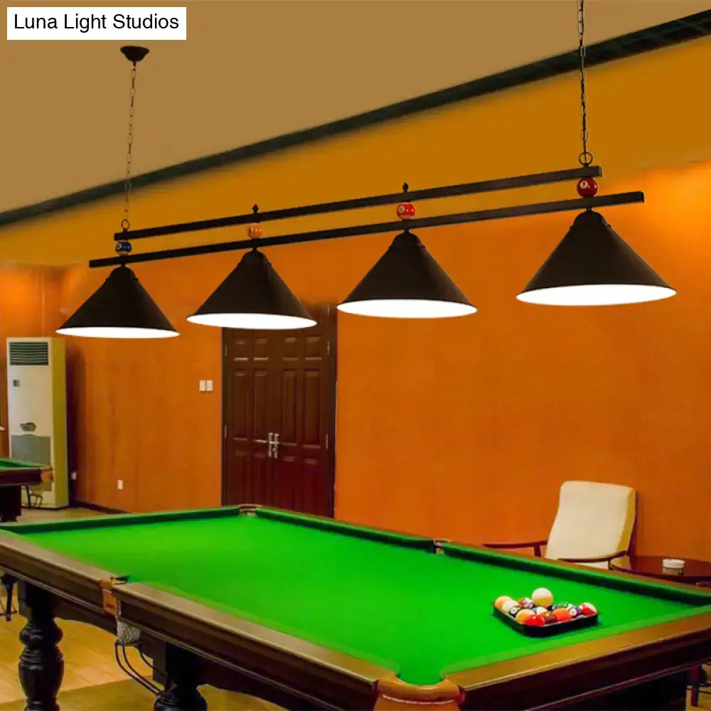 Black conical metal pendant lights with adjustable chain cord length hang above dark green bar island lighting fixture