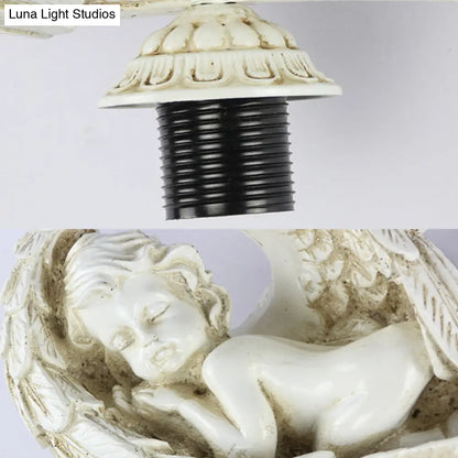 مصباح حائط على شكل ورقة ملاك نائم من الراتينج بتصميم ريفي - زجاج ملون، شفاف/بيج