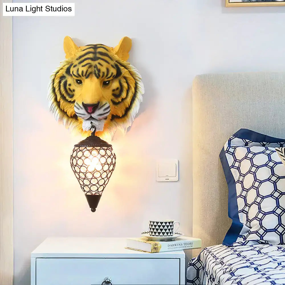 Country tiger head wall sconce in yellow with black stripes and clear crystal shade for bedroom lighting