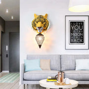 Country tiger head wall sconce with yellow and black stripes and woven metal lantern featuring clear crystal shade wall lamp