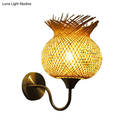 Warm-toned countryside beige rattan wall light sconce with bamboo weaving and curved brass arm for 110v-120v 220v-240v use