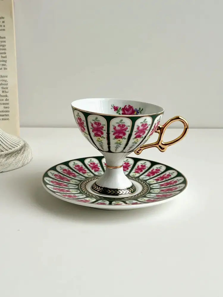 Elegant porcelain cup set with vibrant pink roses and gold handle from decorbites court style for dining room use