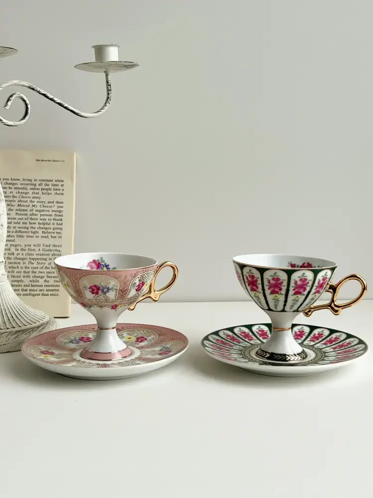 Court style floral porcelain cup set with gold handles featuring pink floral and green geometric patterns for decorbites court style dining room
